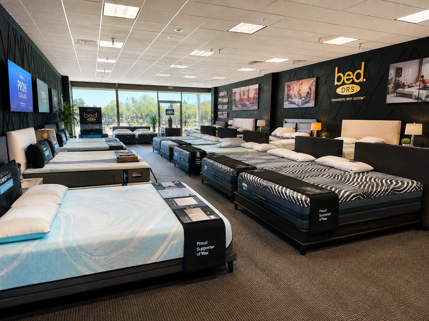 Inside the Bed DRS Scottsdale showroom with rows of premium mattresses